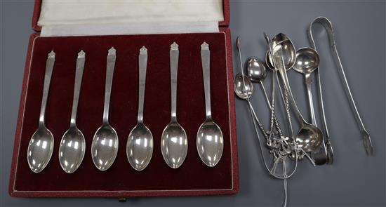 A cased set of silver spoons, two pairs of silver tongs and six assorted spoons.